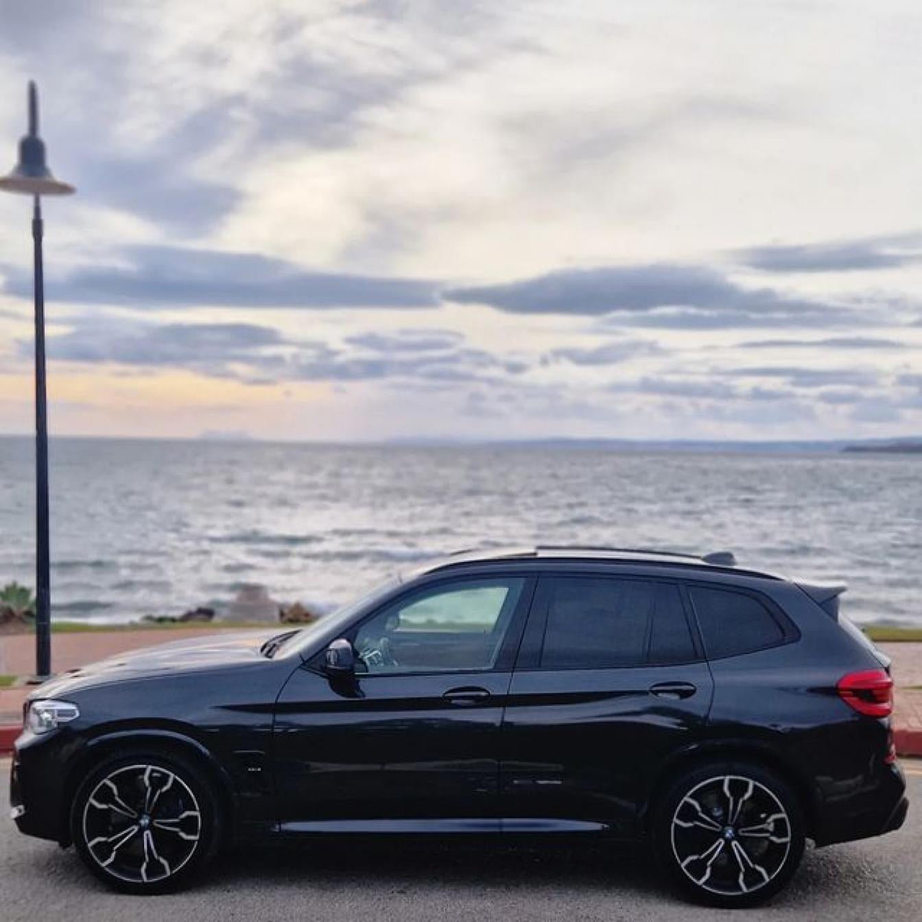 Black BMW X3 M Competition SUV for rent in Marbella – automatic, 5-seater, sporty high-performance vehicle.