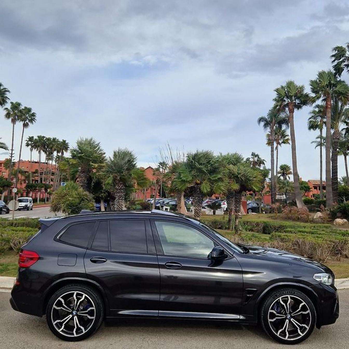 Black BMW X3 M Competition SUV for rent in Marbella – automatic, 5-seater, sporty high-performance vehicle.