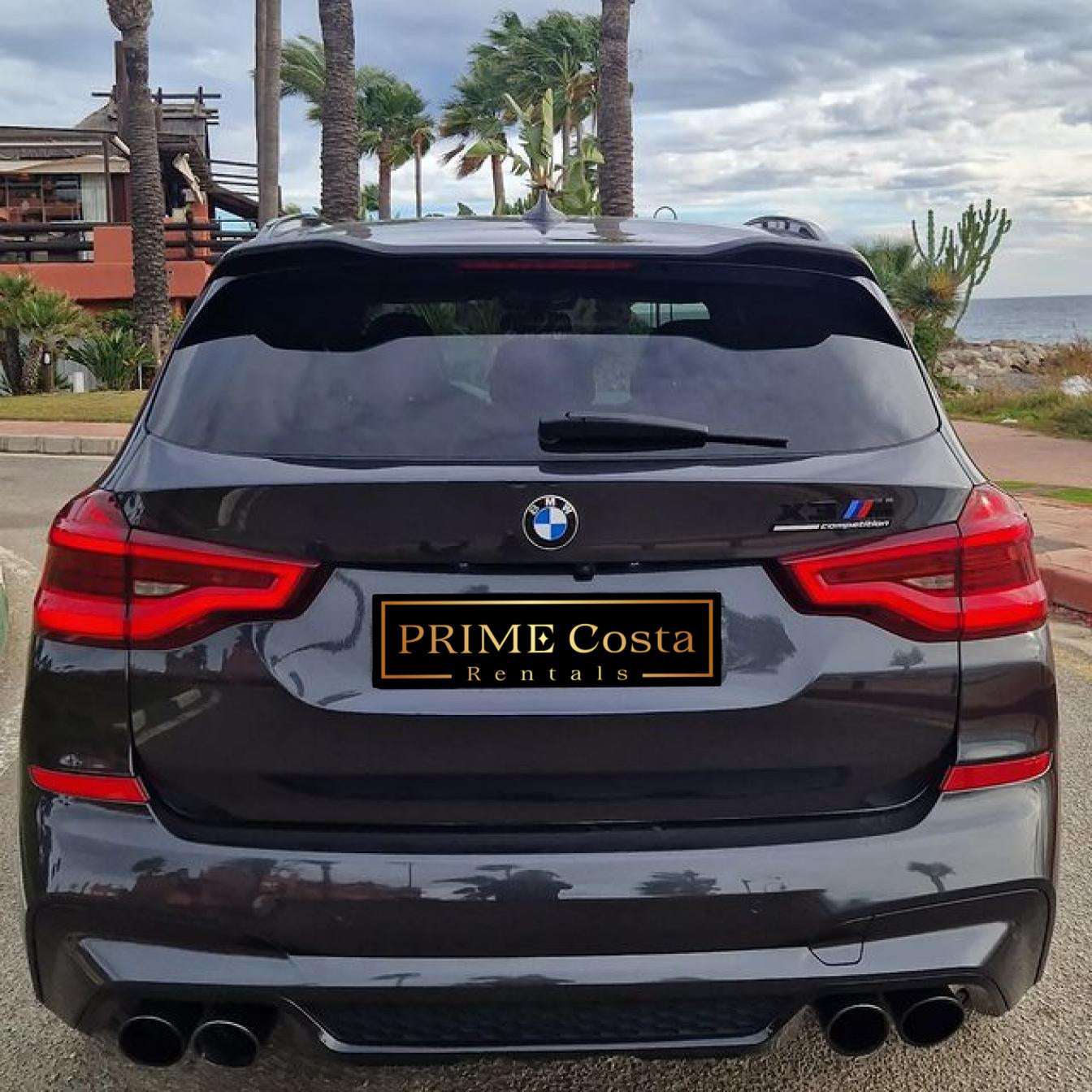 Black BMW X3 M Competition SUV for rent in Marbella – automatic, 5-seater, sporty high-performance vehicle.