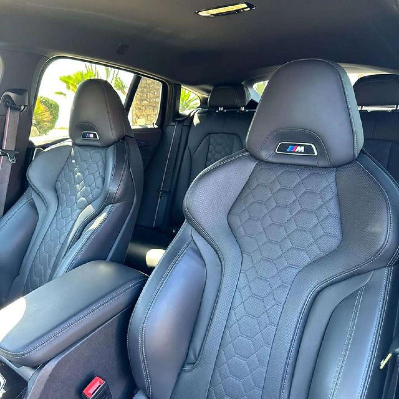 Yellow BMW X4 M Competition SUV for rent in Marbella – automatic, bold 5-seater with sporty style and premium features.