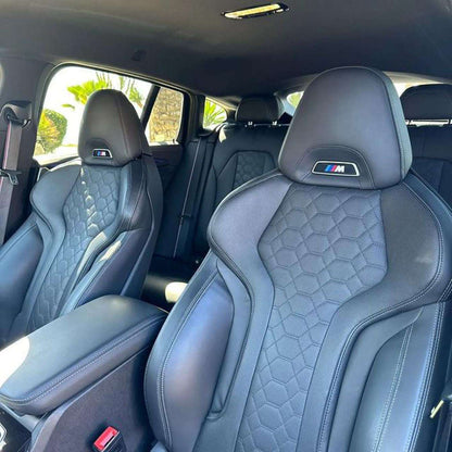 Yellow BMW X4 M Competition SUV for rent in Marbella – automatic, bold 5-seater with sporty style and premium features.