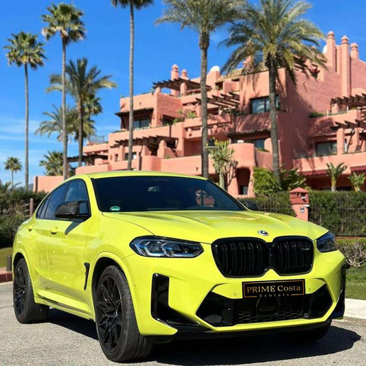 Yellow BMW X4 M Competition SUV for rent in Marbella – automatic, bold 5-seater with sporty style and premium features.