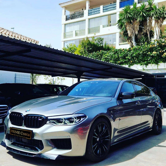 Silver BMW M5 sedan for rent in Marbella – 4.4L automatic, 4WD, 0–100 km/h in 3.4 seconds, top speed 300 km/h.