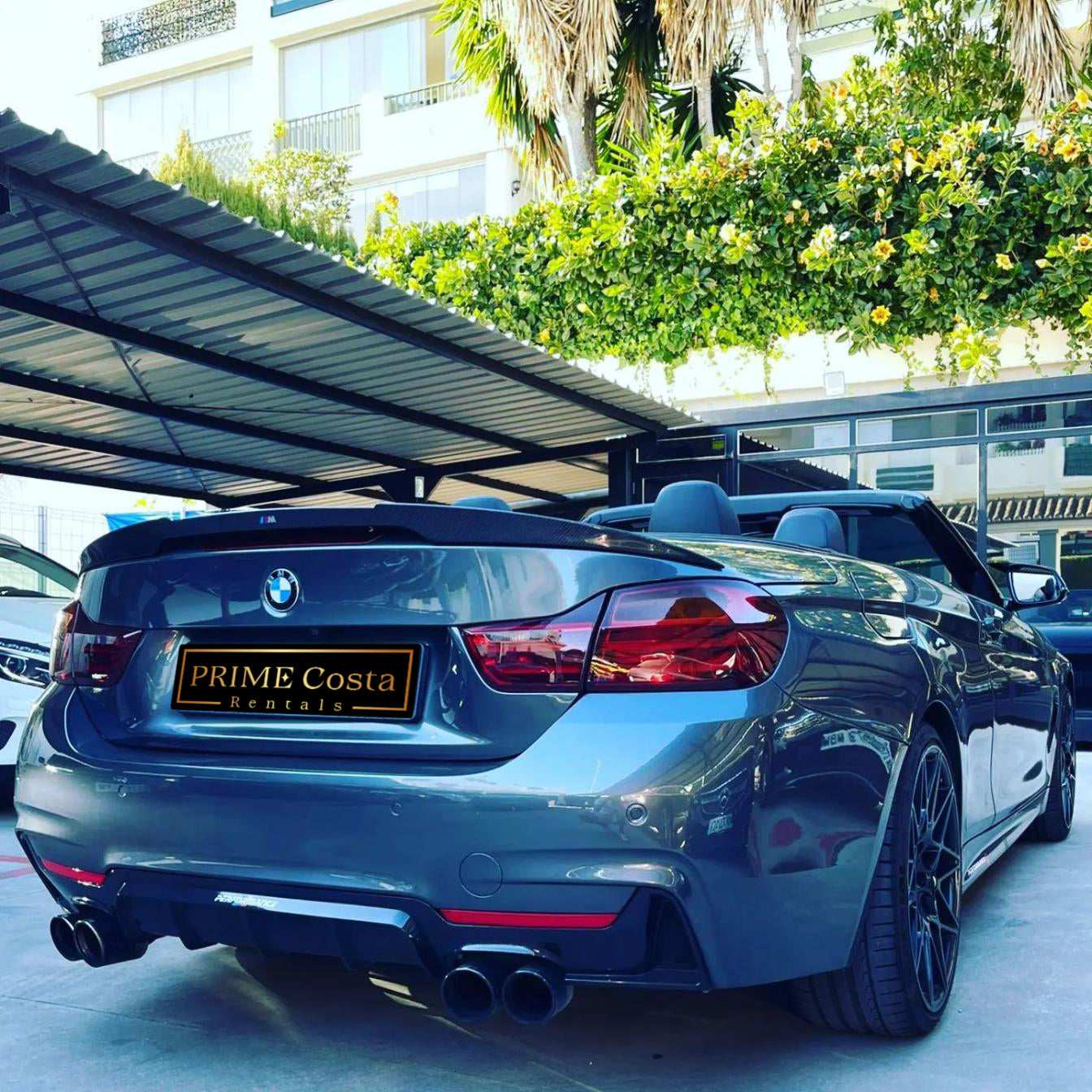 Silver BMW 428M Cabrio for rent in Marbella – 2.0L engine, 230 HP, automatic convertible, 4 seats.