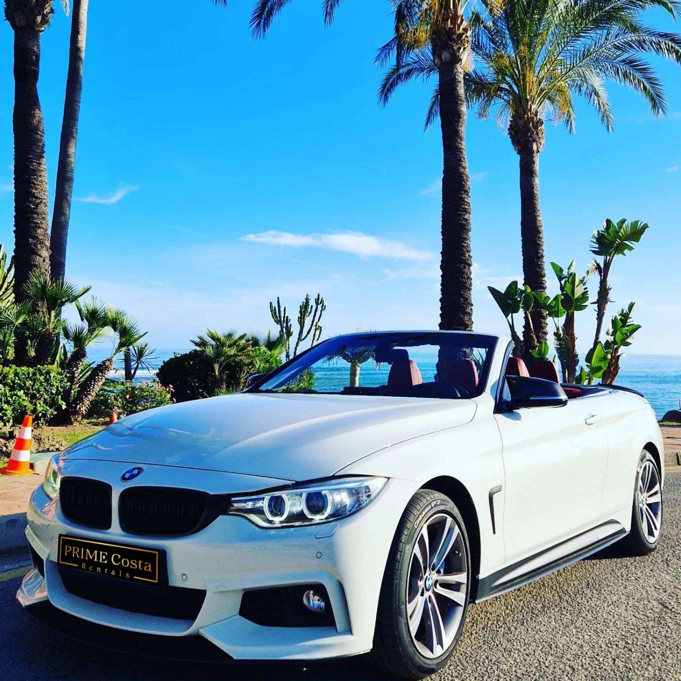 White BMW 428M Cabrio for rent in Marbella – 4-seater automatic convertible, 2.0L engine, sporty and stylish.