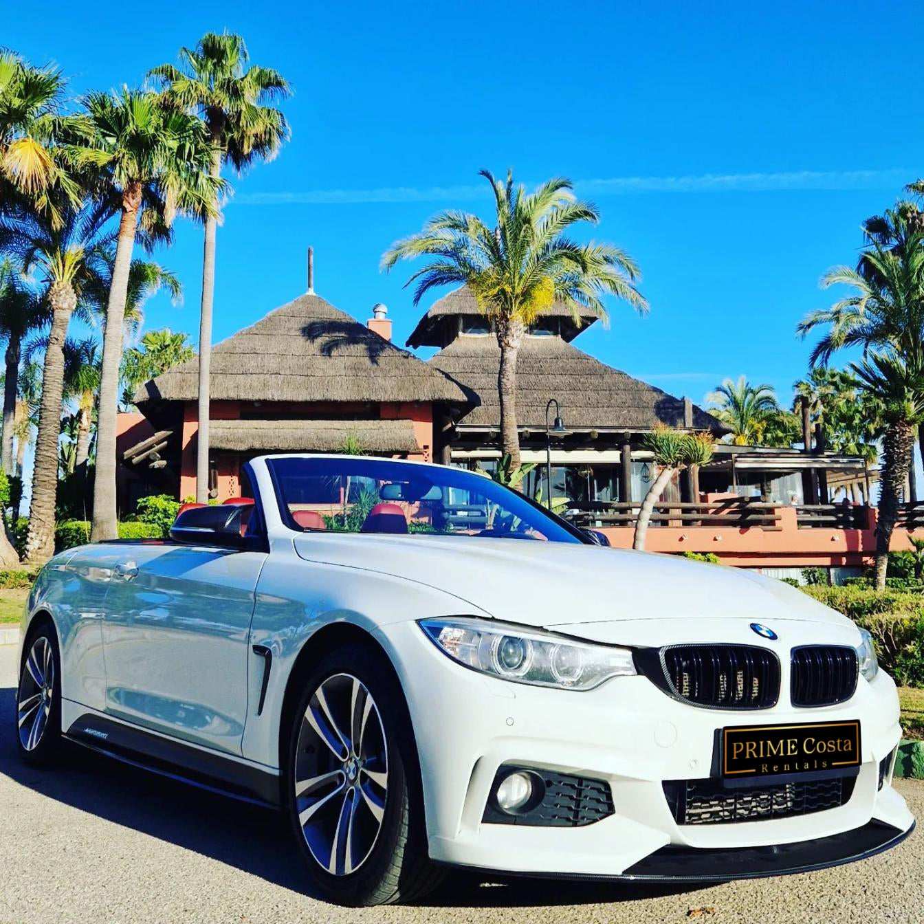 White BMW 428M Cabrio for rent in Marbella – 4-seater automatic convertible, 2.0L engine, sporty and stylish.