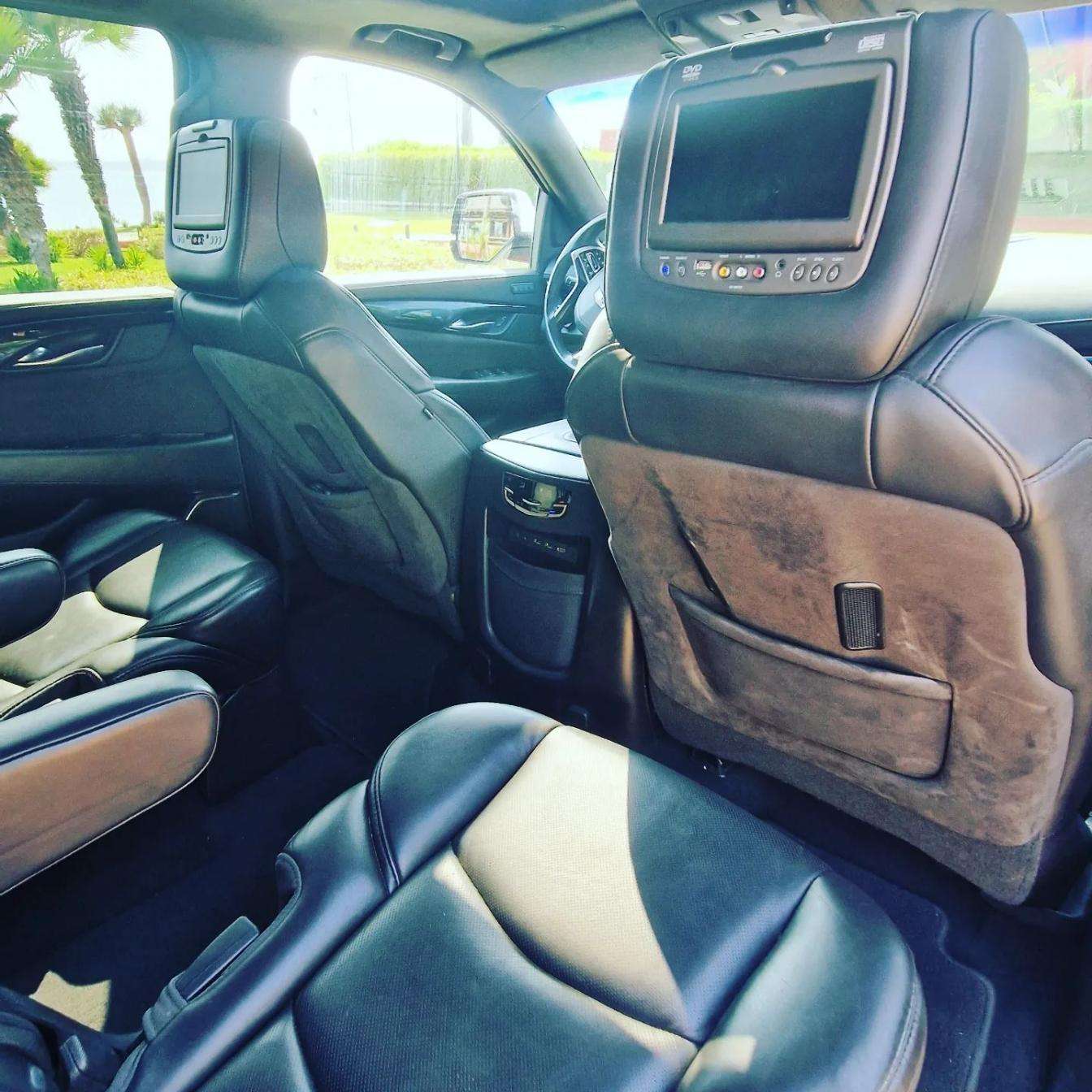 White Cadillac Escalade SUV for rent in Marbella – 6.2L V8, automatic 4WD, 7-seater luxury vehicle.
