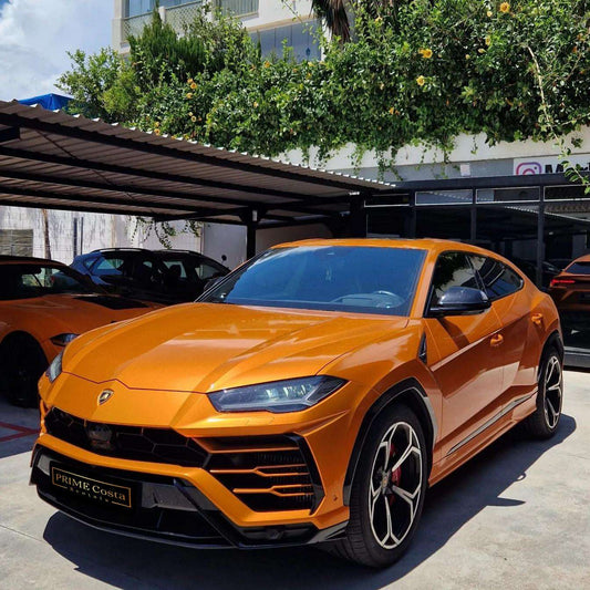 Orange Lamborghini Urus SUV for rent in Marbella – 641 HP, 4.0L V8, 4WD, automatic, 5 seats.
