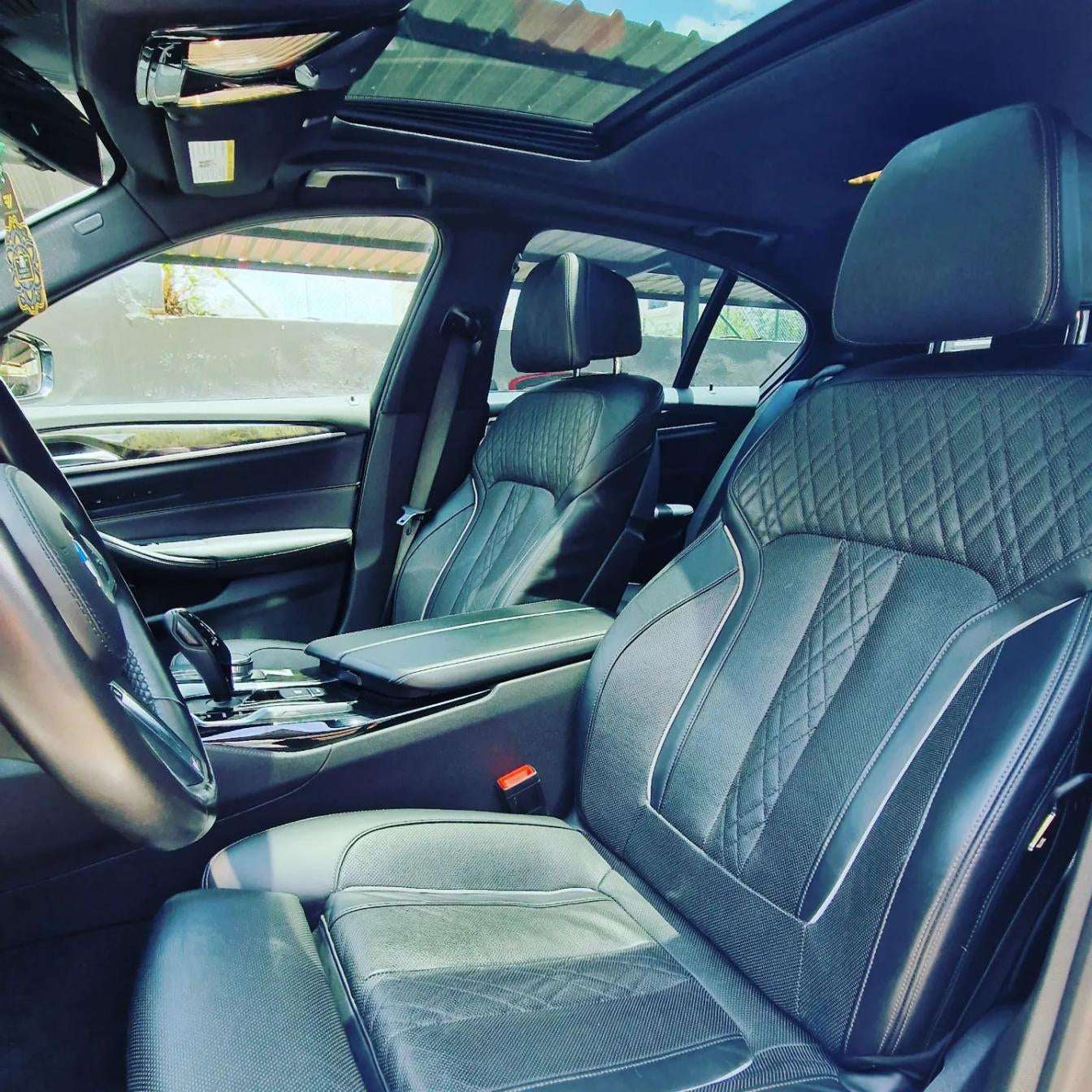 White BMW 540i F90 sedan for rent in Marbella – 3.0L engine, 333 HP, 0–100 in 4.6 sec, automatic 5-seater.