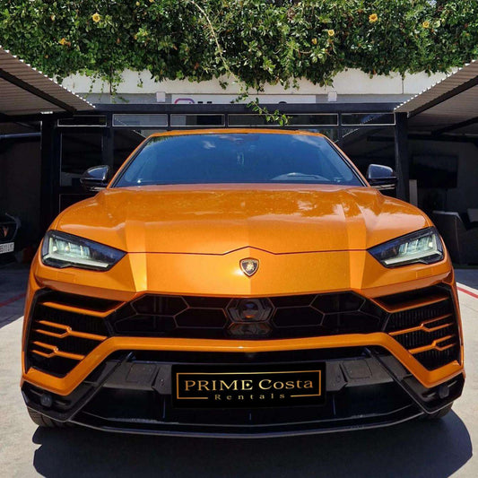 Orange Lamborghini Urus SUV for rent in Marbella – 641 HP, 4.0L V8, 4WD, automatic, 5 seats.
