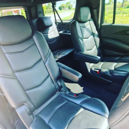 White Cadillac Escalade SUV for rent in Marbella – 6.2L V8, automatic 4WD, 7-seater luxury vehicle.

