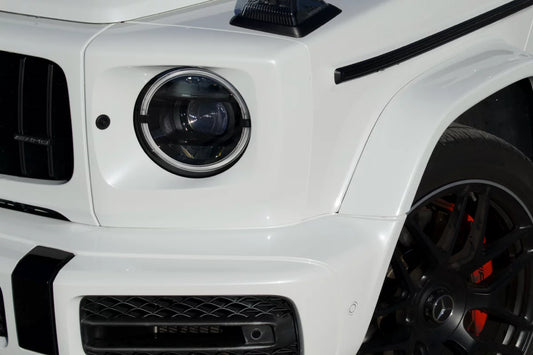 White 2023 Mercedes-AMG G 63 luxury SUV parked in Marbella, available for rent at Prime Costa Rentals.
