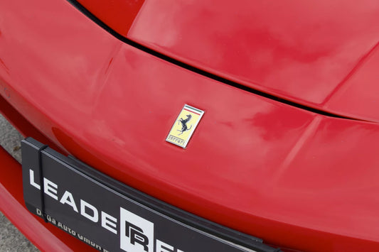 Red 2018 Ferrari 488 Spider convertible parked in Marbella, available for rent from Prime Costa Rentals.
