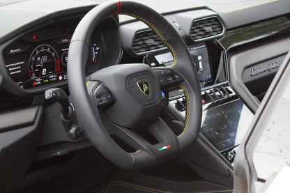 Yellow 2023 Lamborghini Urus S luxury SUV parked in Marbella, available for rent at Prime Costa Rentals.
