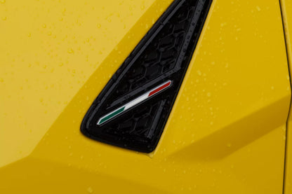Yellow 2023 Lamborghini Urus S luxury SUV parked in Marbella, available for rent at Prime Costa Rentals.
