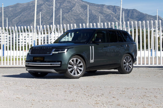 Green 2022 Range Rover Autobiography SUV parked in Marbella, available for rent from Prime Costa Rentals.