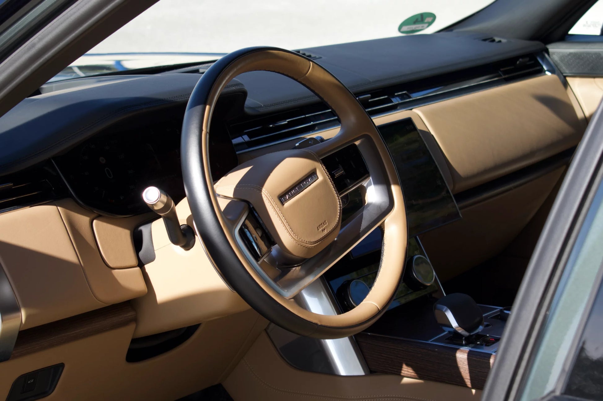 Green 2022 Range Rover Autobiography SUV parked in Marbella, available for rent from Prime Costa Rentals.