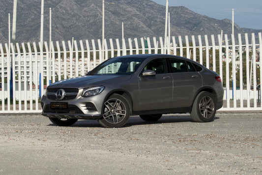 Grey 2019 Mercedes-Benz GLC Coupe parked in Marbella, available for rent at Prime Costa Rentals.
