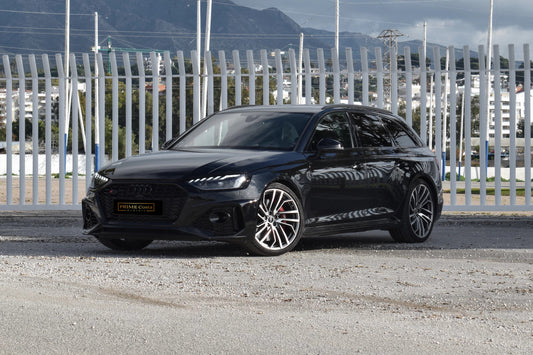 Black 2023 Audi RS 4 Avant sport wagon parked in Marbella, available for rent at Prime Costa Rentals.
