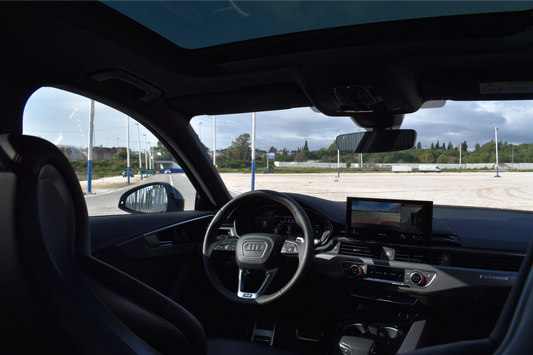 Black 2023 Audi RS 4 Avant sport wagon parked in Marbella, available for rent at Prime Costa Rentals.
