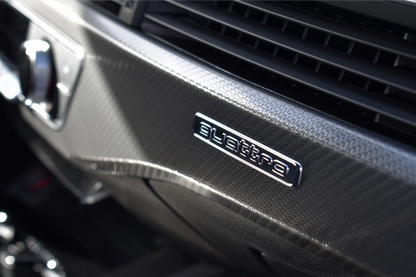 Black 2023 Audi RS 4 Avant sport wagon parked in Marbella, available for rent at Prime Costa Rentals.
