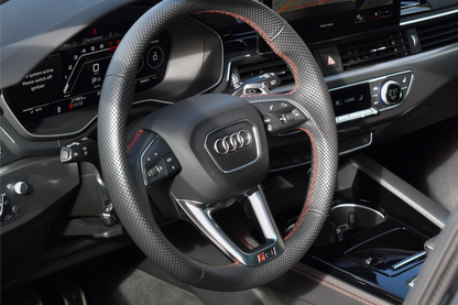 Black 2023 Audi RS 4 Avant sport wagon parked in Marbella, available for rent at Prime Costa Rentals.

