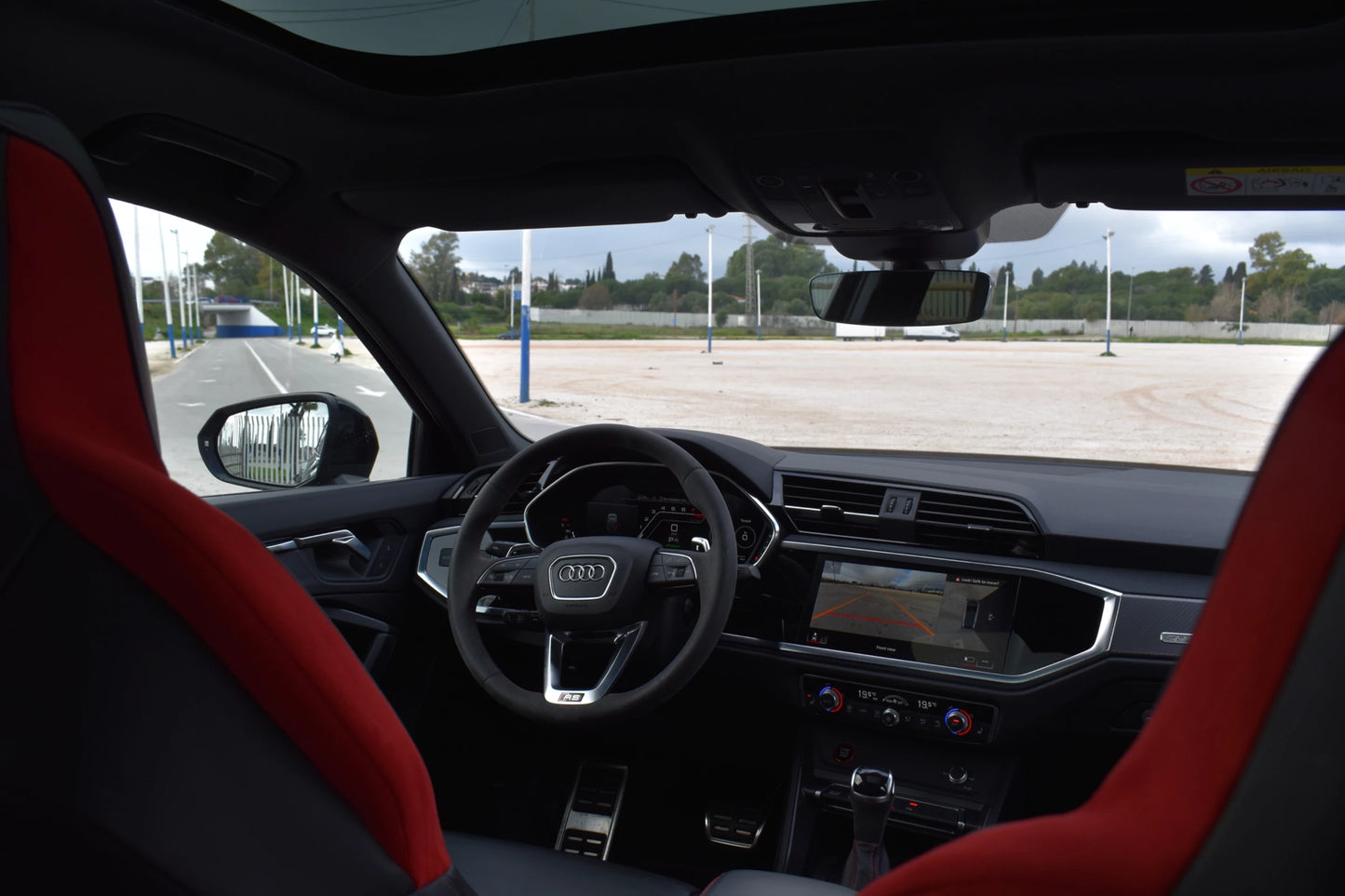 Black 2023 Audi RS Q3 Sportback SUV parked in Marbella, available for rent from Prime Costa Rentals.
