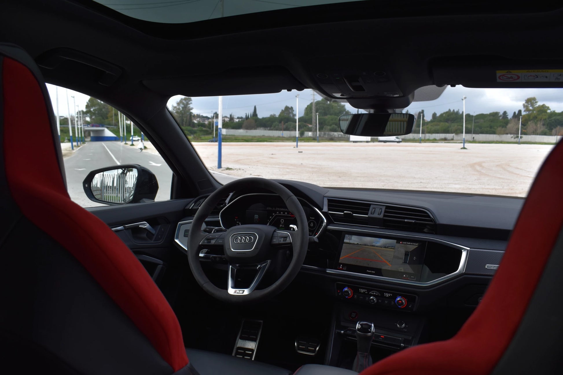 Black 2023 Audi RS Q3 Sportback SUV parked in Marbella, available for rent from Prime Costa Rentals.
