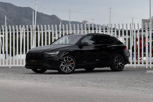 Black 2023 Audi SQ8 luxury SUV parked in Marbella, available for rent from Prime Costa Rentals.
