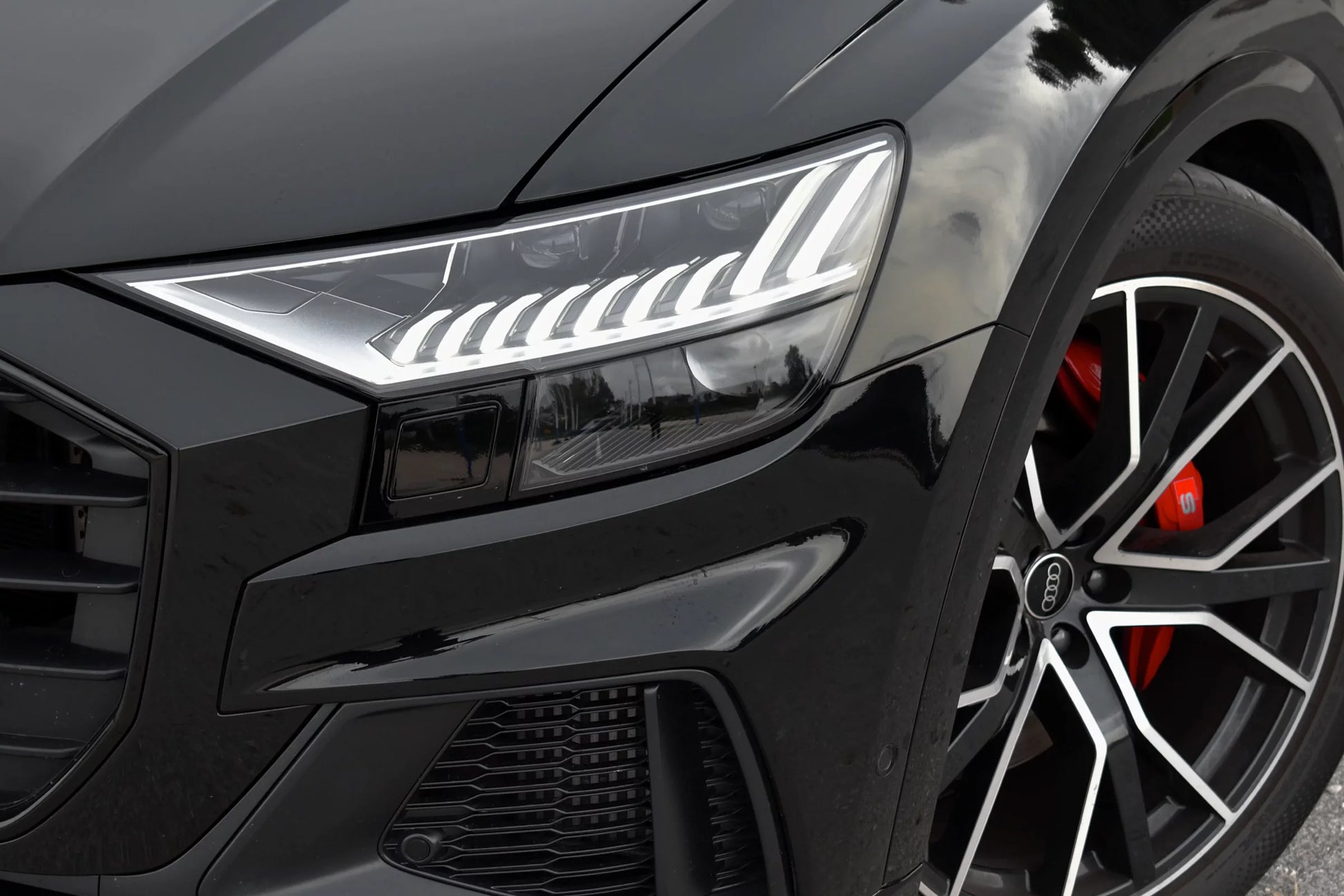 Black 2023 Audi SQ8 luxury SUV parked in Marbella, available for rent from Prime Costa Rentals.
