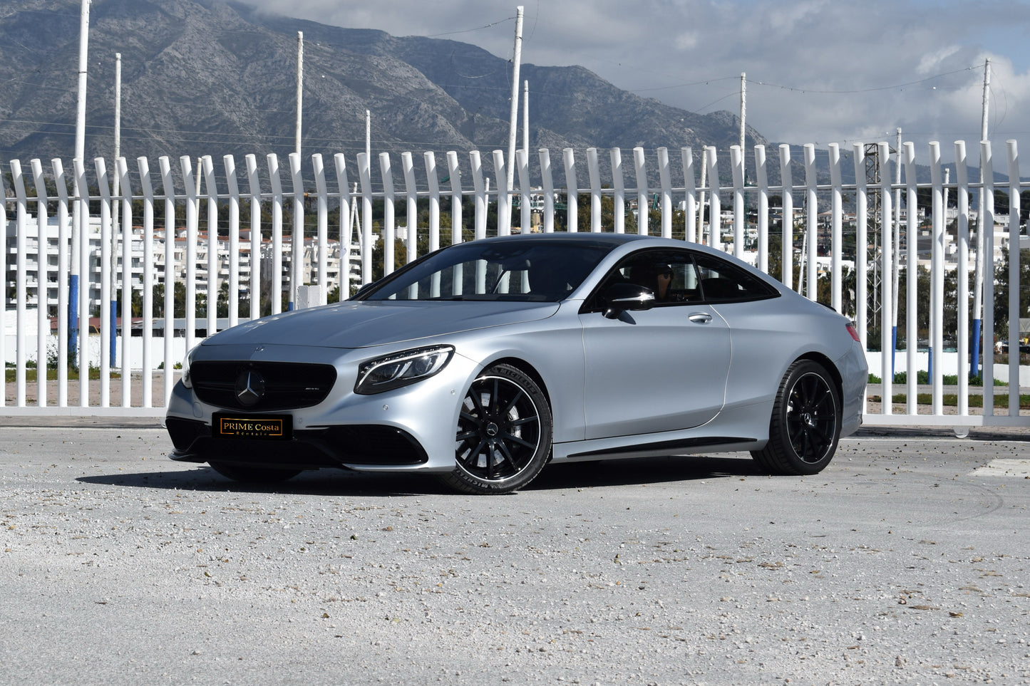 Grey 2017 Mercedes-AMG S 63 Coupe parked in Marbella, available for rent from Prime Costa Rentals.