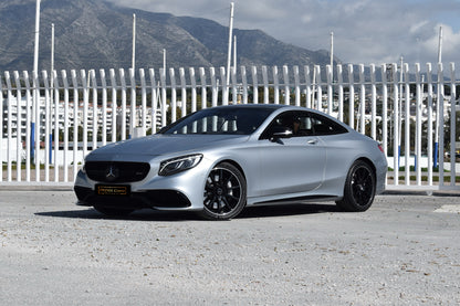 Grey 2017 Mercedes-AMG S 63 Coupe parked in Marbella, available for rent from Prime Costa Rentals.