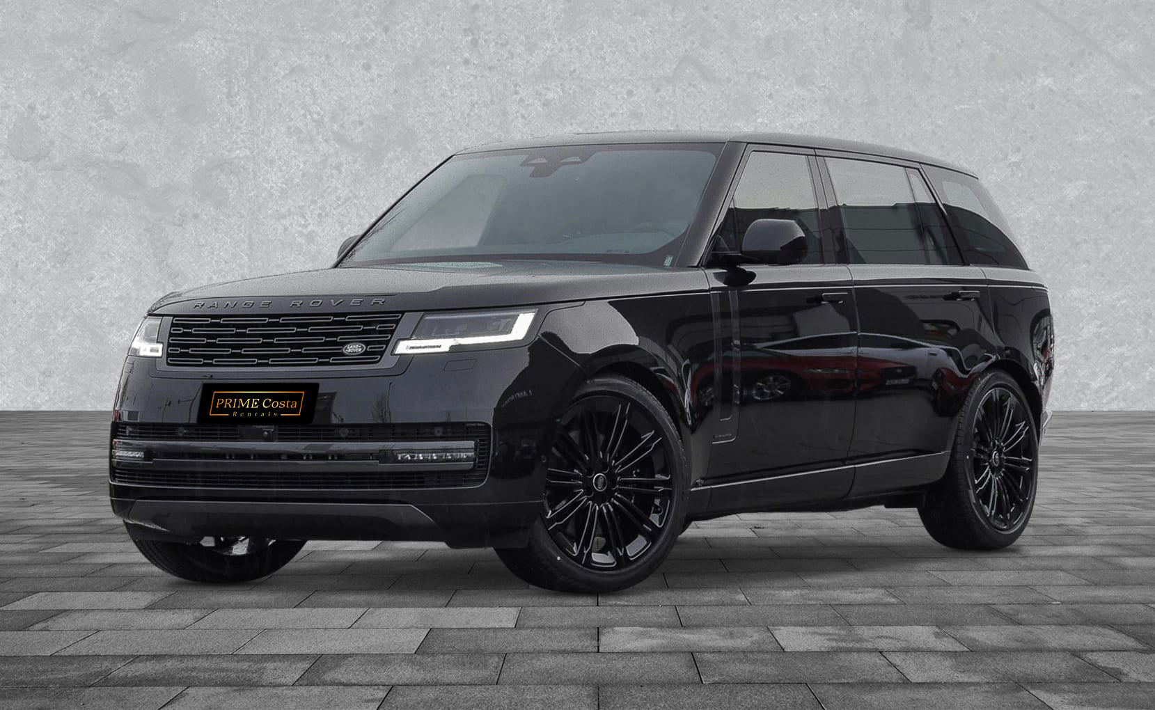 Black 2024 Range Rover Autobiography LWB parked in Marbella, available for rent from Prime Costa Rentals.
