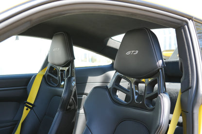 Yellow 2023 Porsche 911 GT3 parked in Marbella, available for rent from Prime Costa Rentals.
