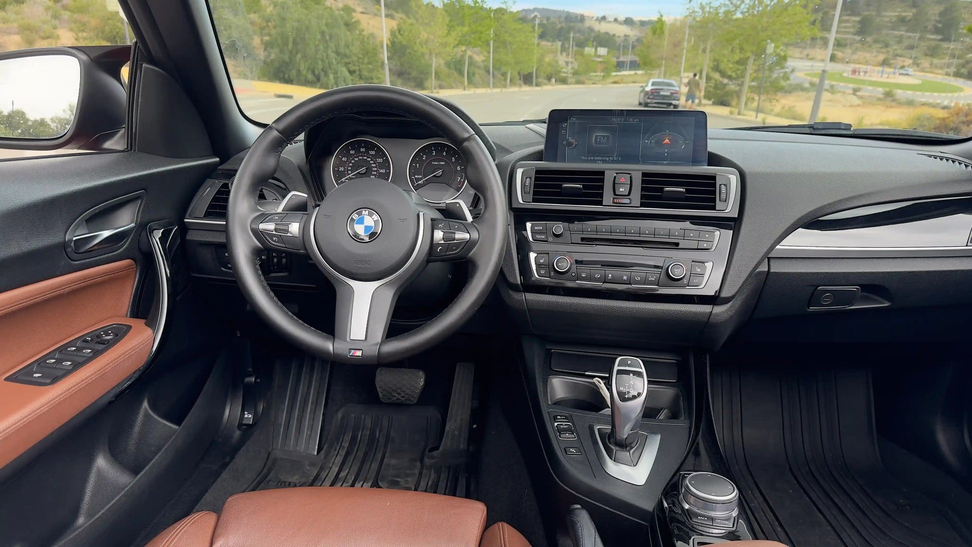 BMW 2 Series Convertible brown interior, dashboard and steering wheel pictures on the street in Spain