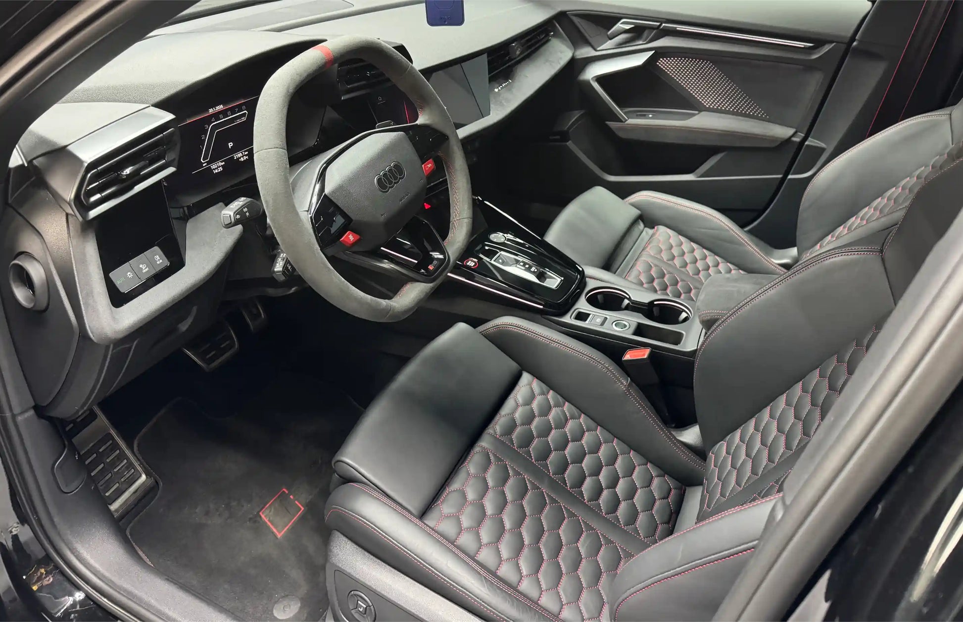 Audi RS3 2025 interior with sport bucket seats and automatic transmission – luxury performance rental