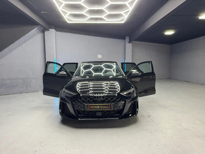 Audi RS3 2025 for rent Costa Blanca – aggressive sport styling with doors open ready to drive