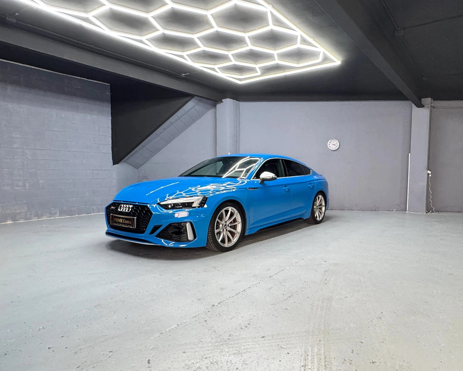 2020 Audi RS5 Blue front right side  parked near the coast in spain