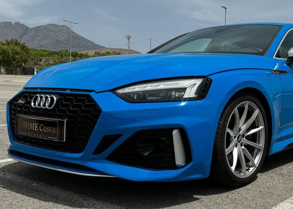 2020 Audi RS5 Blue front right side  parked near the coast in spain