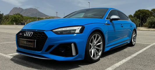 2020 Audi RS5 Blue parked near the coast