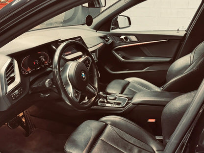 BMW 118i M Pack interior with automatic transmission and premium leather seats for rent