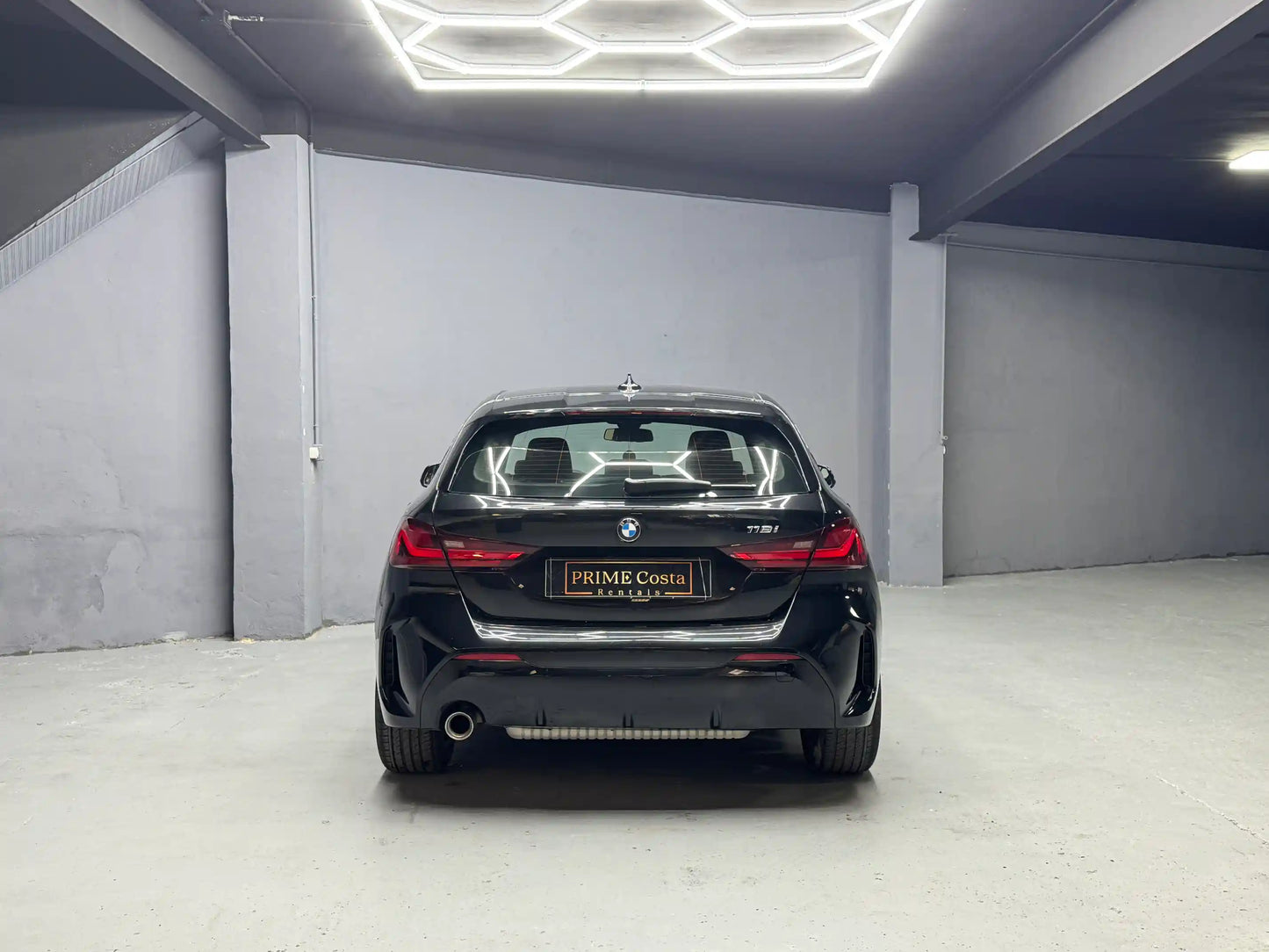 BMW 118i M Pack rental in Alicante with sporty rear design and LED taillights