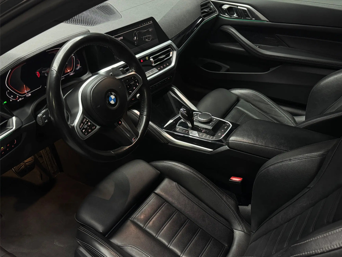 BMW 430i convertible interior with digital cockpit and automatic transmission