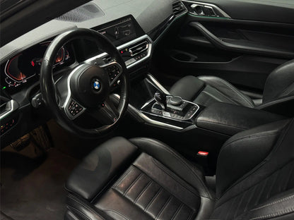 BMW 430i convertible interior with digital cockpit and automatic transmission