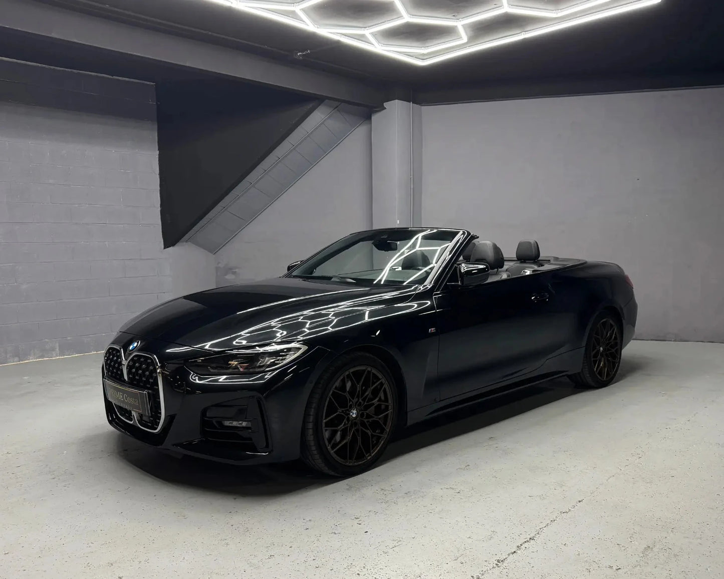 BMW 430i convertible parked indoors available for hire in Benidorm