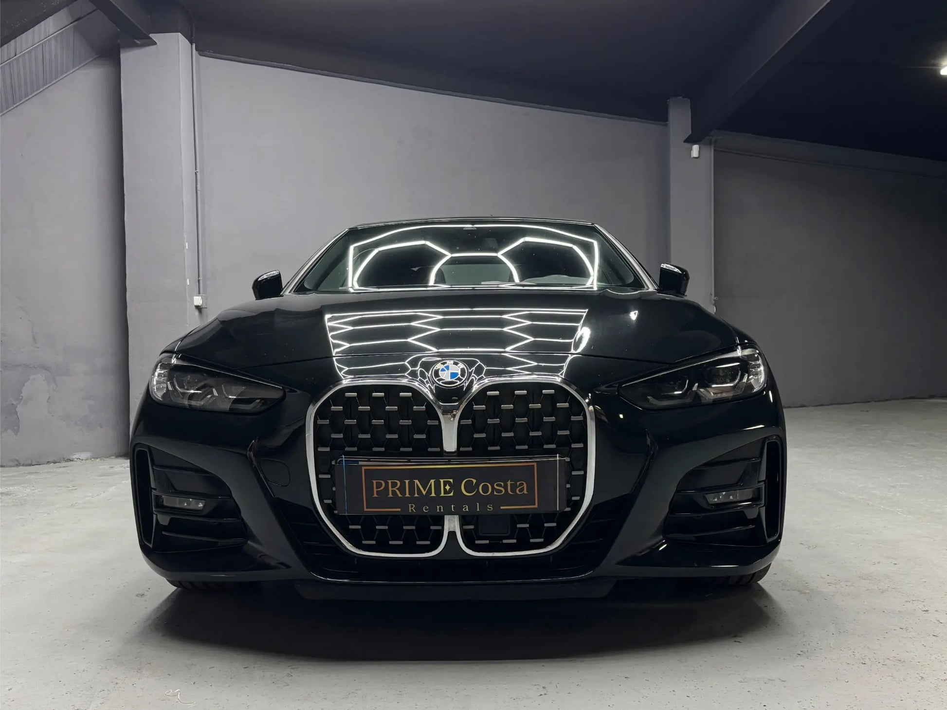 Front view of BMW 430i convertible available for premium car rental in Costa Blanca