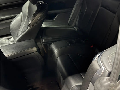 Rear passenger seating area inside BMW 430i convertible rental car