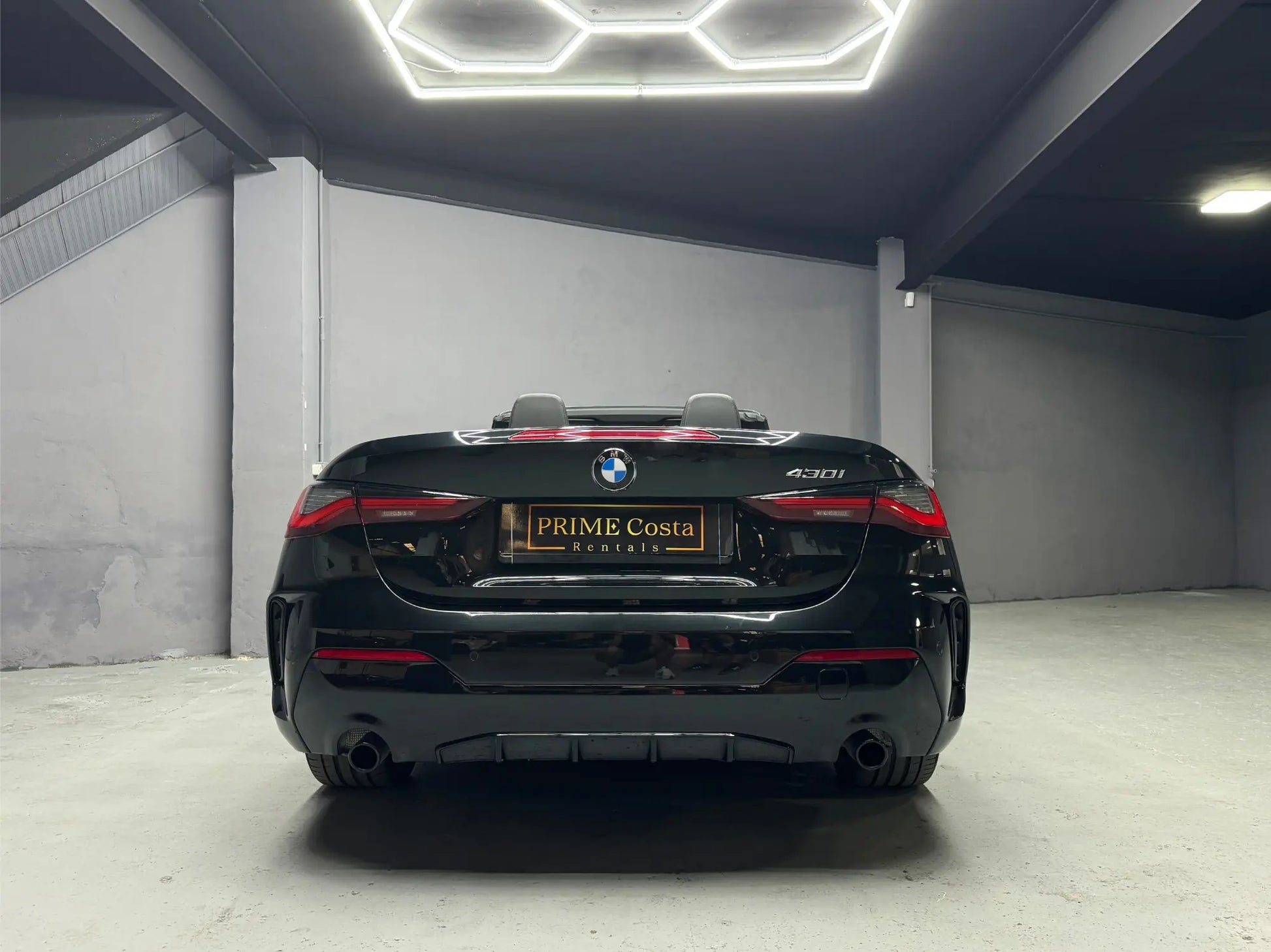 Rear view of BMW 430i convertible available for luxury car hire in Alicante