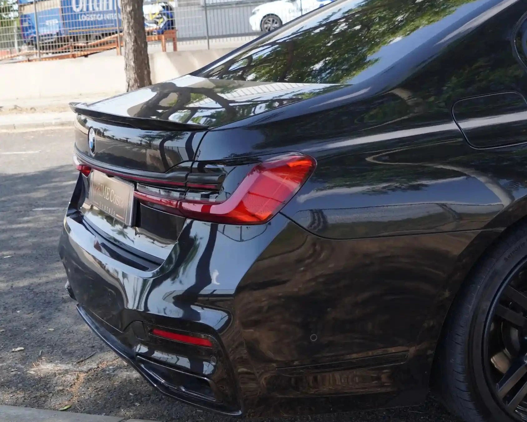BMW 730D M Pack back right side on street with trees