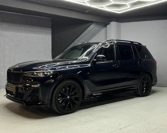 BMW X7 M50i large luxury SUV side profile ideal for family and group travel Spain